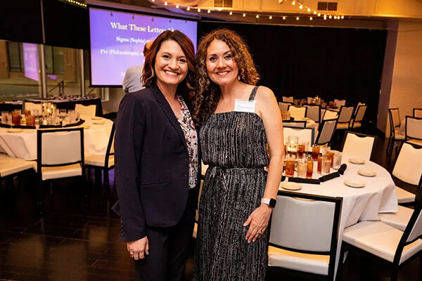 two women at Sigma Phi Alpha (Alpha Gamma Chapter) + Omicron Kappa Upsilon (Rho Chapter) banquet at Grand Street Cafe in Kansas City, Missouri on April 20, 2021